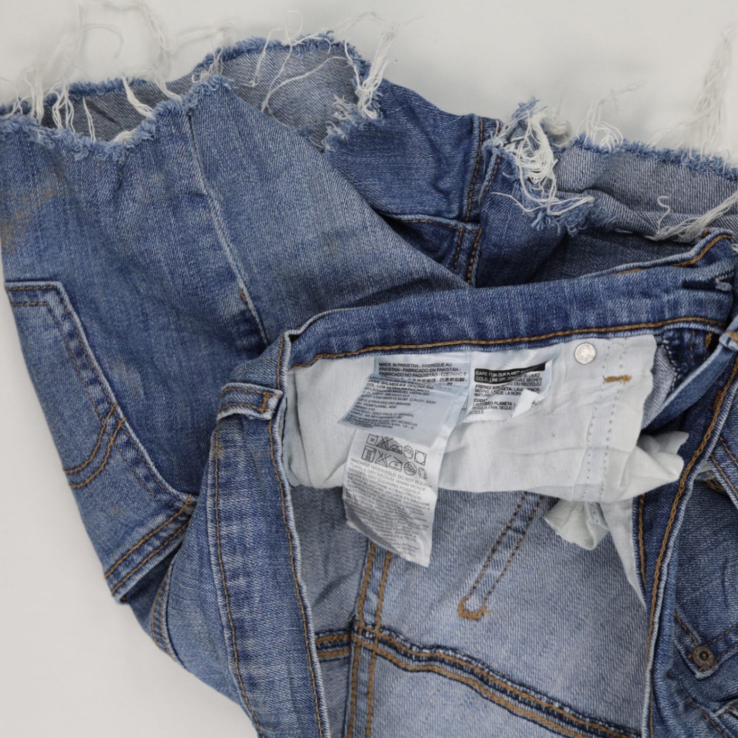 Levi's Blue Denim Frayed Edge Mid-Rise Shorts - Classic Summer Style for Women - 100% Cotton, Size W28