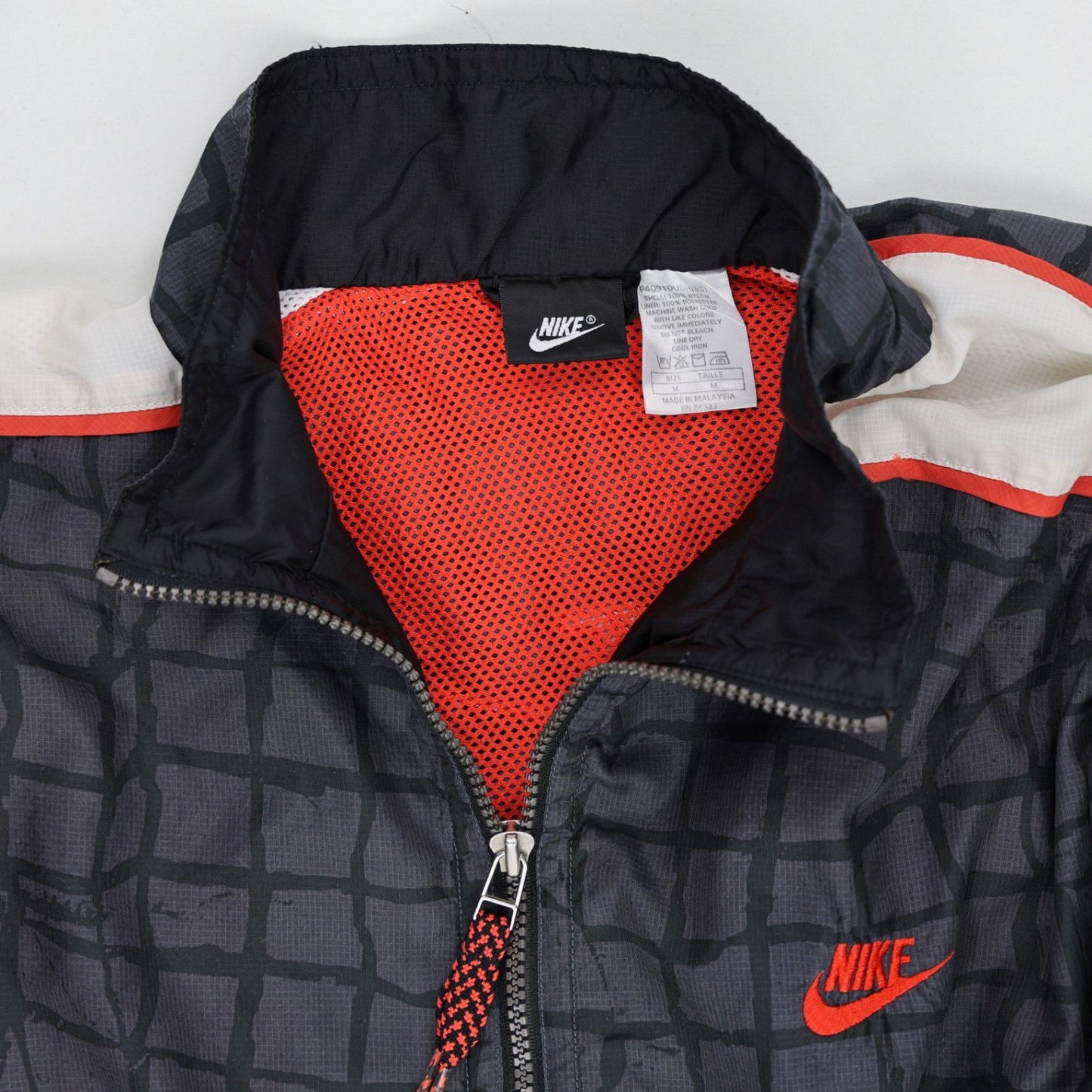 Nike Vintage Black Grid Pattern Windbreaker Jacket Size L Polyester Stand Collar